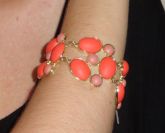 Pulseira dourada (laranja e rosa)